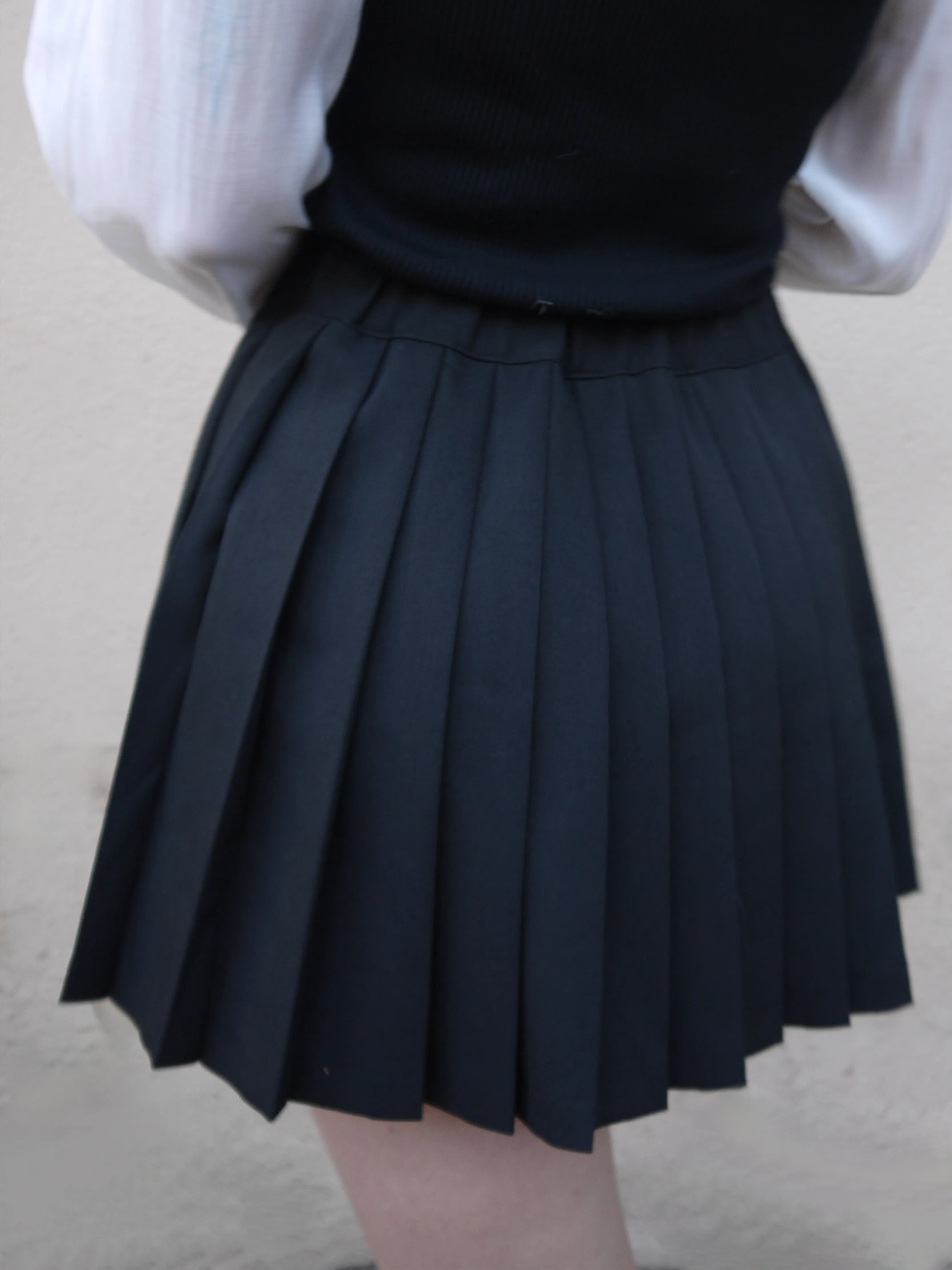 short pleated skirt